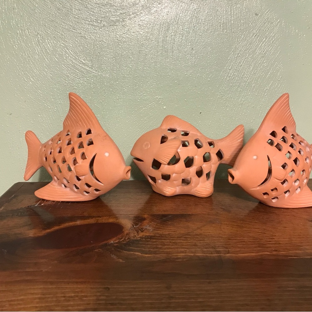 Terracotta Decorative Fish Sculptures with Cutout Patterns
